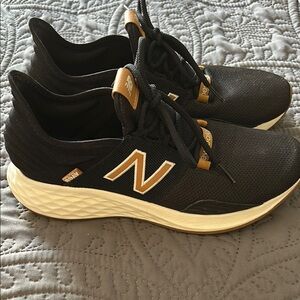 New Balance Black and Gold Athletic Shoes